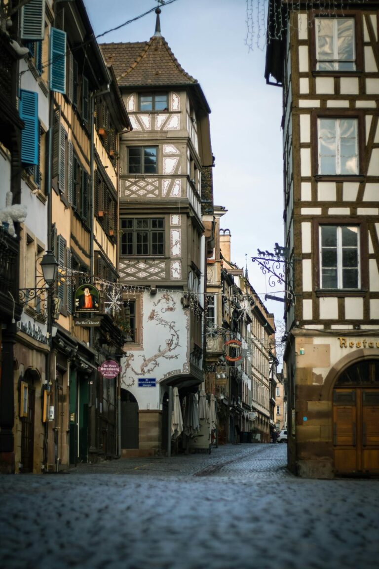 Explore the cobblestone streets and half-timbered architecture of historic Strasbourg, France.